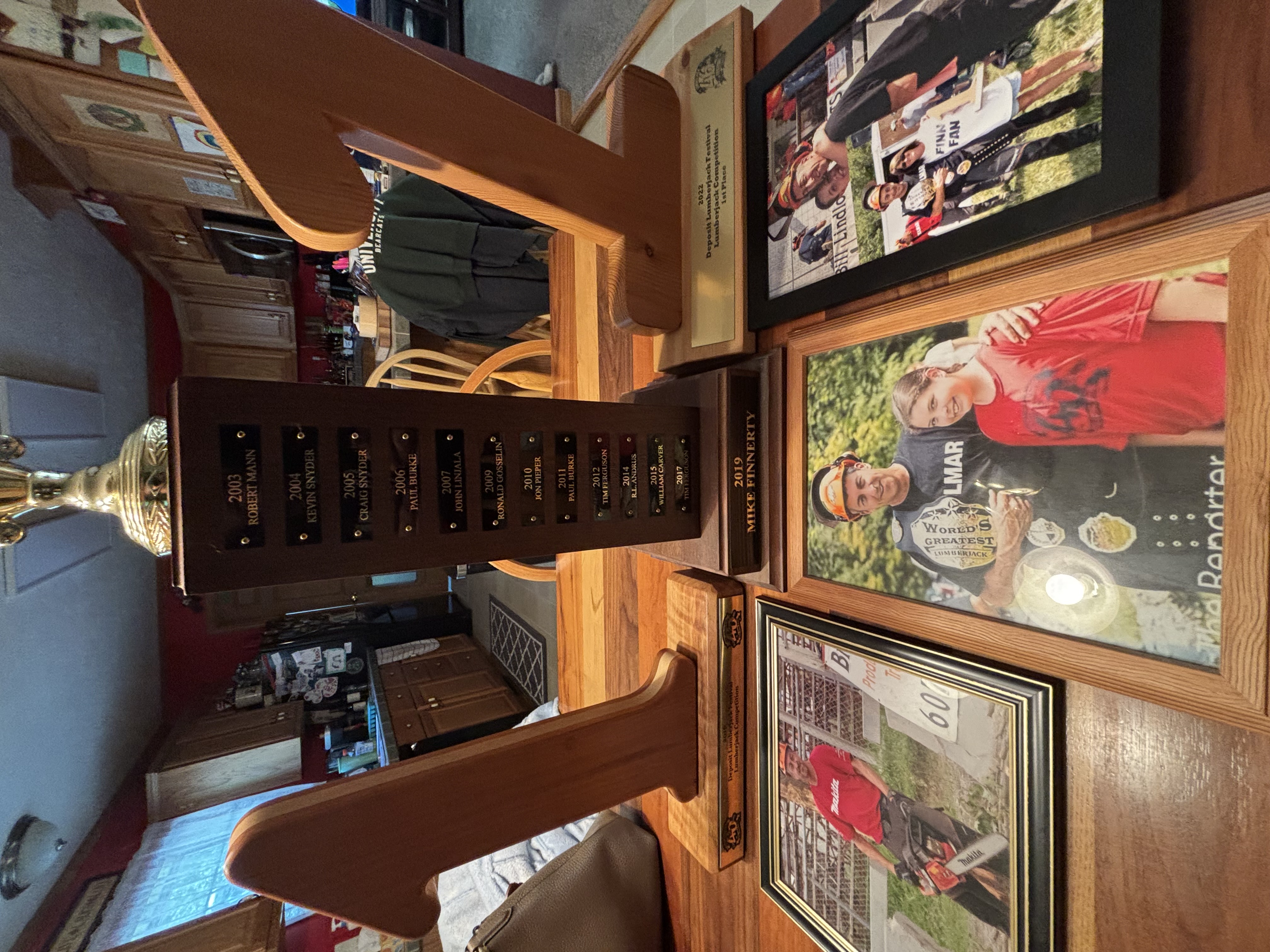 Deposit Lumberjack Festival first-place trophies and the 2019 national trophy